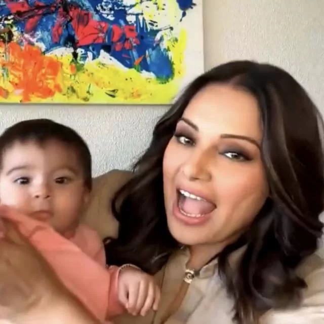 Bipasha Basu On Her Baby Devi Being A Social Butterfly; Says 'She Fights To Show Her Face To Paps'