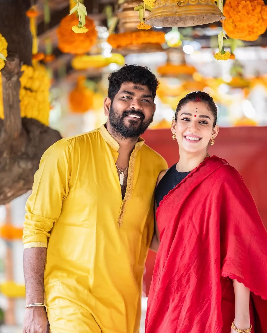 South Actress Nayanthara and Vignesh Shivan's Candid Moment Breaks the Internet: "Just Us" Nayanthara's Simple Yet Heartwarming Message on Social MediaNayanthara and Vignesh Shivan show love in a priceless honest way; they share a glimpse of a new starting. (PC: Nayanthara X (use to be Twitter)) Nayanthara, a major actress, and Vignesh Shivan, a well-known director, met on the sets of Naanum Rowdy Dhaan in 2015. It was said that they officially got married in 2016, but they kept this news about their lives a secret for six years. Finally, in June 2022, their fairy tale came true at a beautiful traditional wedding in Mahabalipuram, Chennai. Notable people from Indian film were there. The sweet couple recently shared a cute picture of themselves on social media. Nayanthara posed beautifully with Vignesh, who looked dapper in a golden kurta and white trousers. She was wearing a red saree with a black top, beautiful statement jewellery and her hair was tied back. People all over the internet fell in love with their genuine happiness and love for each other. Nayanthara posted the sweet photos on X (which used to be Twitter) with the simple but truly heartwarming text "Just Us." She put a heart next to the comment and added it. Adorable Photo of Nayanthara and Vignesh Shivan Captivates Attention Upcoming project of Nayanthara Nayanthara and Jai worked together on the hit movie Raja Rani in 2013. Their new project, Nayanthara Annapoorani - The Goddess of Food, which opened on December 1, brings them back together. The movie, which was directed by Nilesh Krishnaa for the first time, is about a young woman named Poorani who comes from a strict Brahmin family and wants to become a cook in a field that is mostly men. The movie's catchy teaser and touching music hint at a strong social message, set against a background of food dreams and family problems. Zed Studios, Naad Studios, and Trident Arts have all backed this exciting project. The skilled Thaman S is in charge of music, and Sathyan Sooryan is in charge of cinematography. They are all in S. Sashikanth's movie Test together with Madhavan, Sidharth, and Meera Jasmine. The interesting group of characters gives hints of an interesting story, but plot details are being kept secret. Nayanthara and Vignesh Shivan's Candid Moment Breaks the Internet: "Just Us" Nayanthara's Simple Yet Heartwarming Message on Social Media 