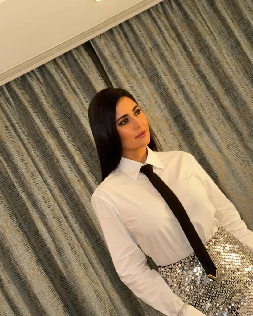 Katrina Kaif's Mesmerizing Fusion Elegance: Silver Sequins and White Shirt Redefine Red Carpet Glamour!